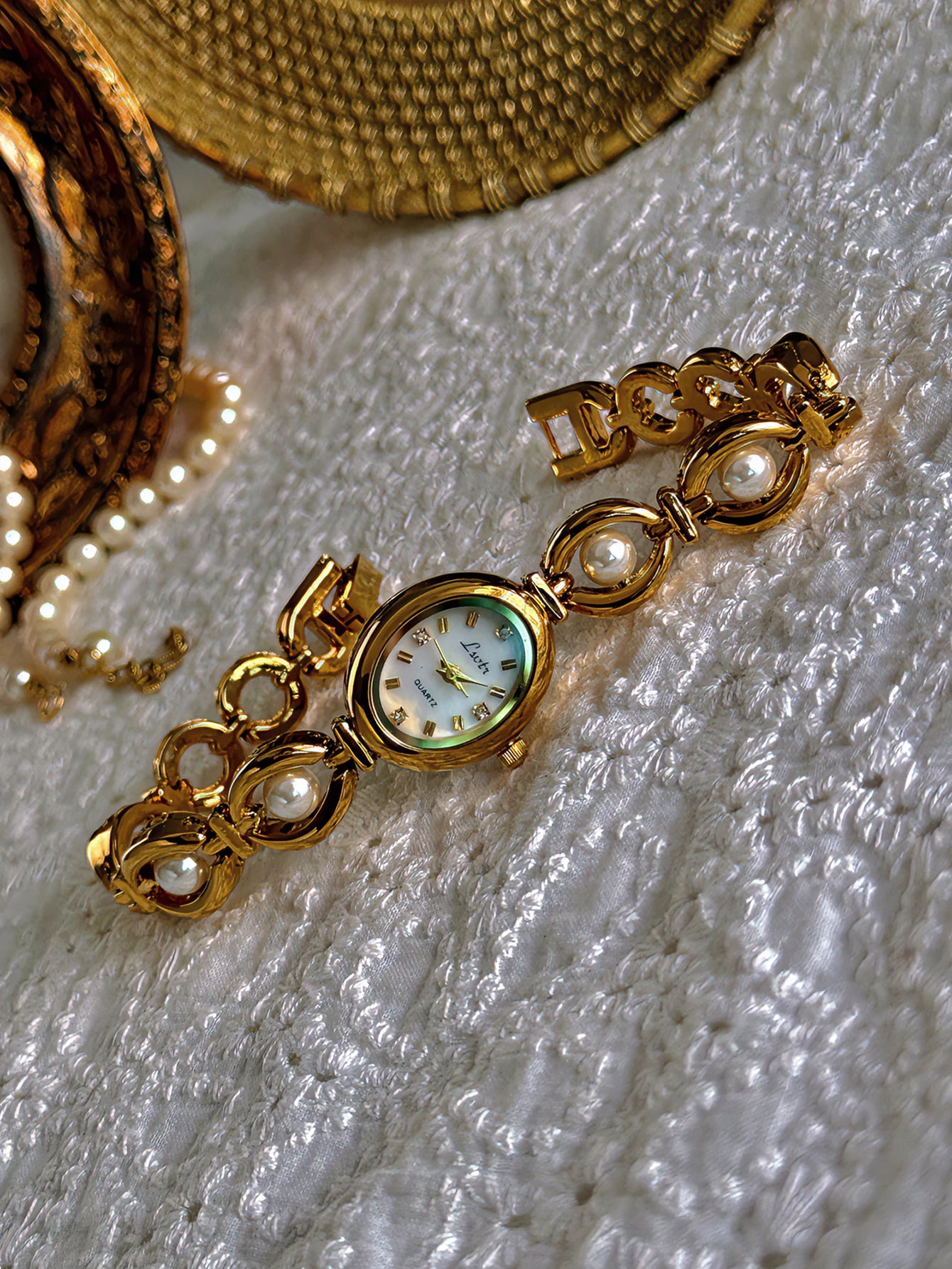 Oval Mother-of-Pearl Women's Watch - Pearl & Rhinestone Accents