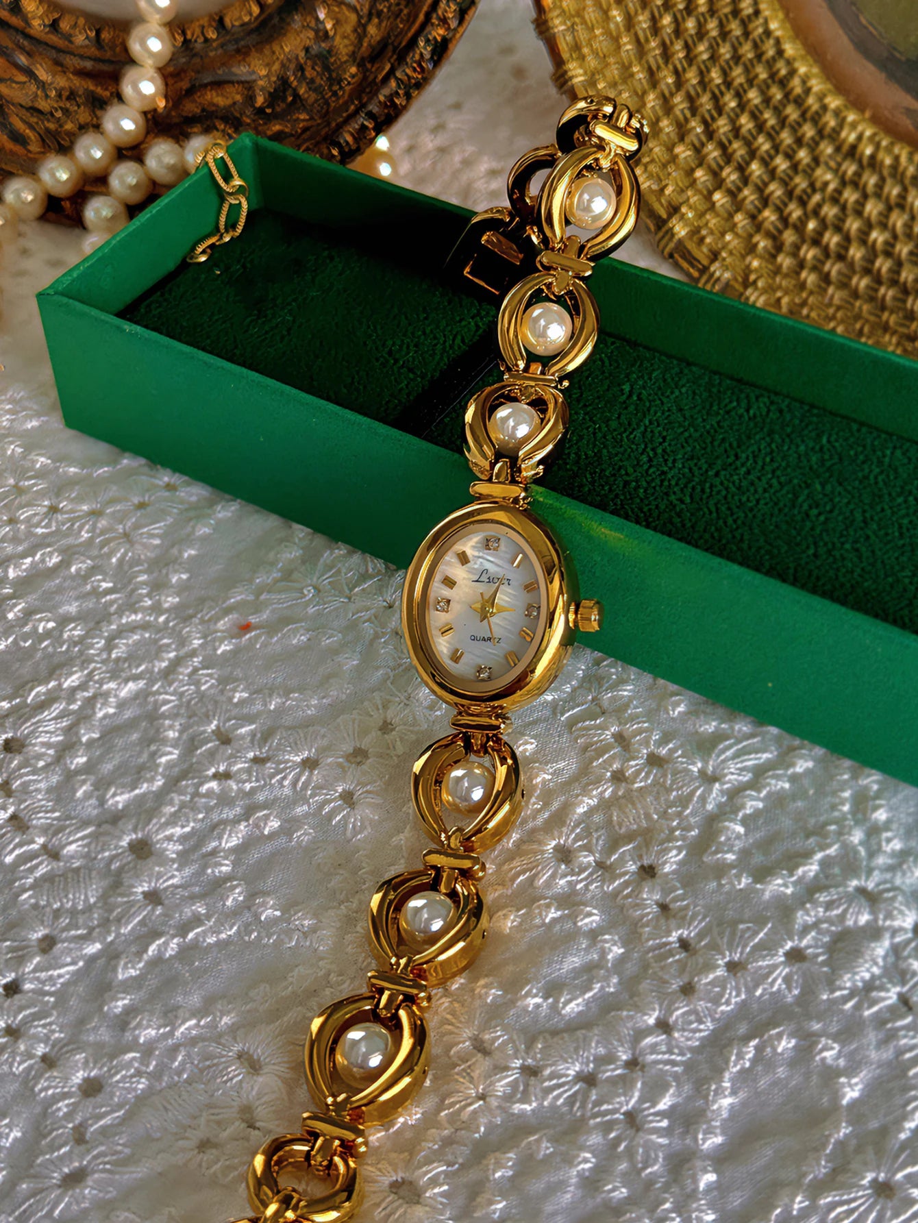 Oval Mother-of-Pearl Women's Watch - Pearl & Rhinestone Accents