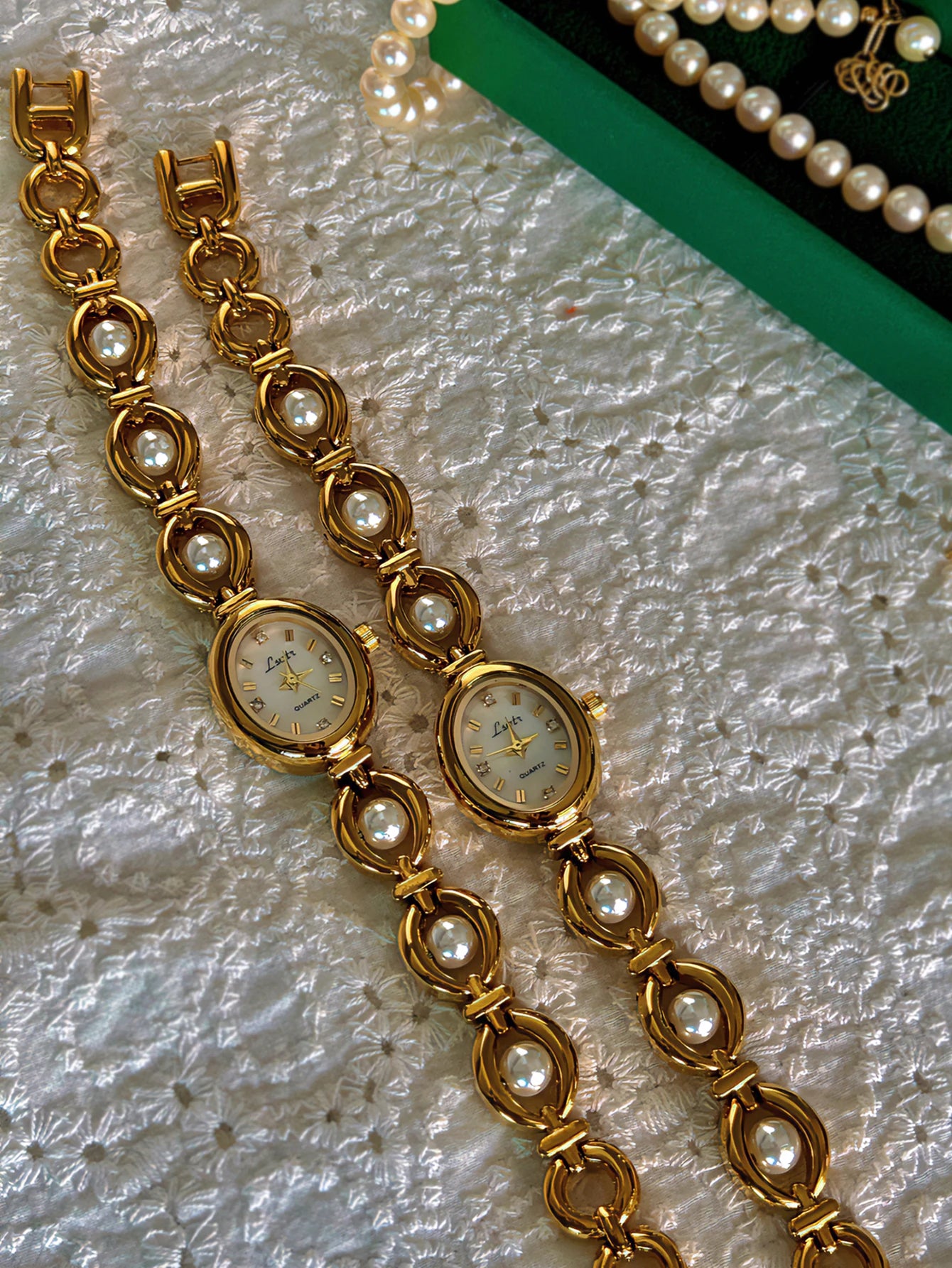 Oval Mother-of-Pearl Women's Watch - Pearl & Rhinestone Accents