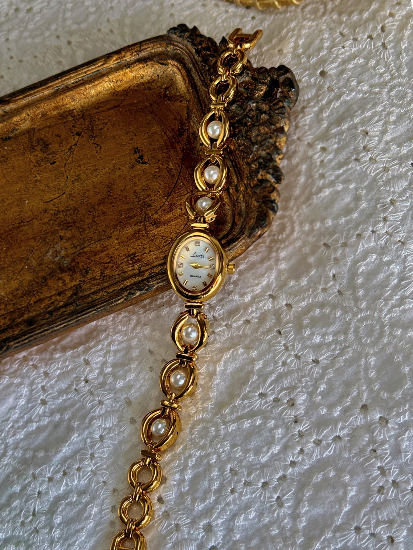 Oval Mother-of-Pearl Women's Watch - Pearl & Rhinestone Accents