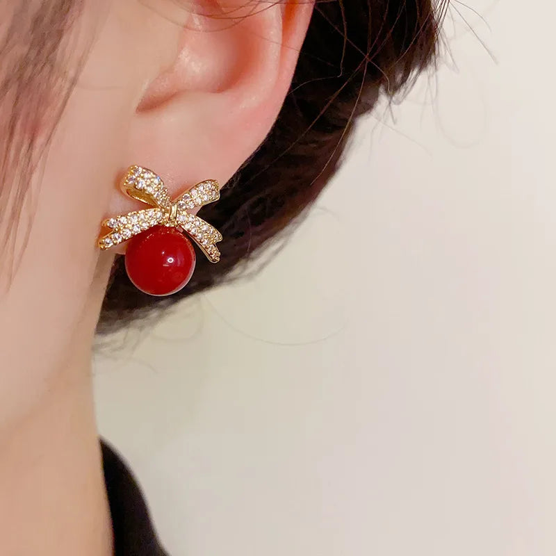 Rhinestone Bow Pearl Stud Earrings